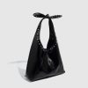 104b6246-931d-4e91-844f-08fb637e4511 Tote Bag Rivet Bow Underarm Bag Women's Bucket Bag